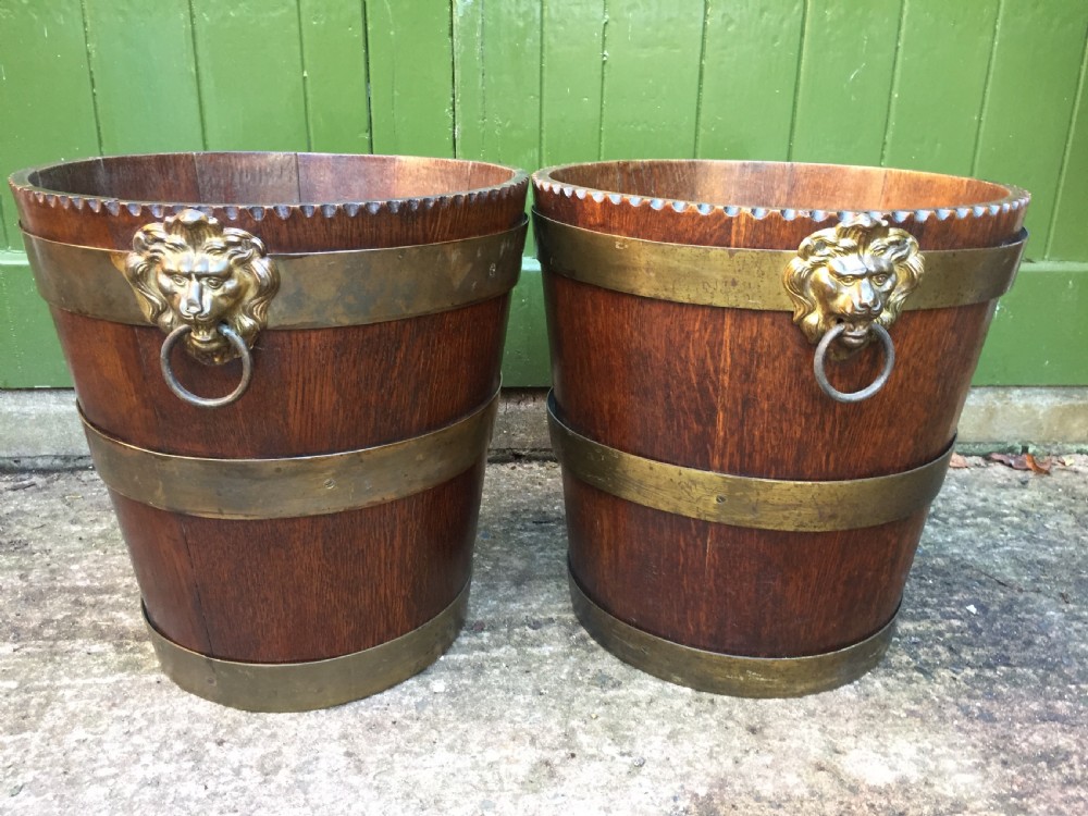 Pair of early C19th brass-bound oak log or peat fireside buckets fitted with brass lions-mask ring handles . View VIII