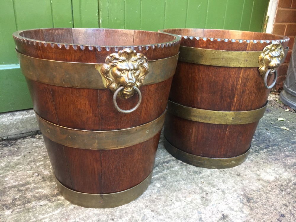 Pair of early C19th brass-bound oak log or peat fireside buckets fitted with brass lions-mask ring handles . View IX