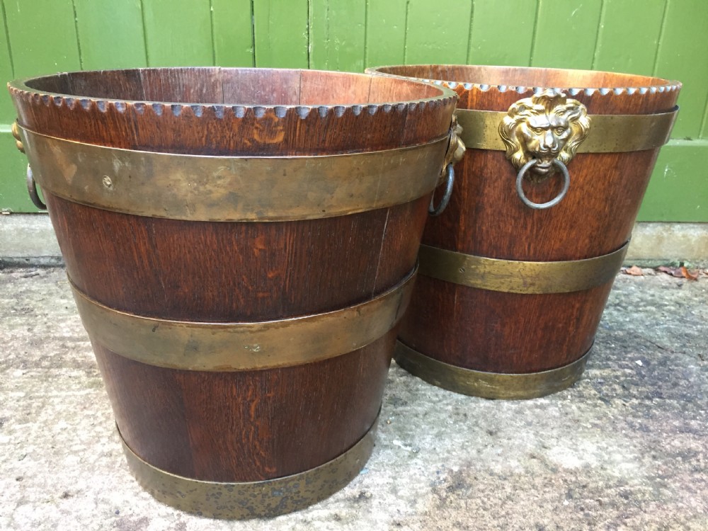 Pair of early C19th brass-bound oak log or peat fireside buckets fitted with brass lions-mask ring handles . View XII