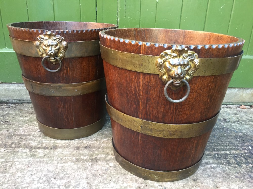 Pair of early C19th brass-bound oak log or peat fireside buckets fitted with brass lions-mask ring handles . View XIII