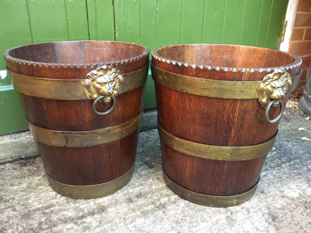 Pair of early C19th brass-bound oak log or peat fireside buckets fitted with brass lions-mask ring handles . View XV