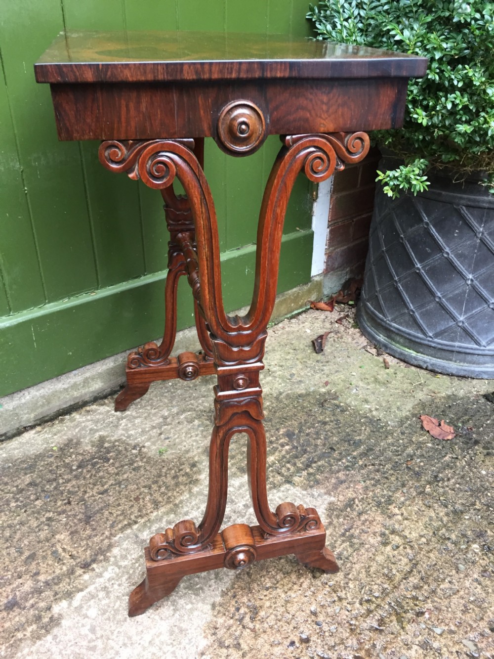Smart early C19th George IV period rosewood lamp table on a carved base. View III