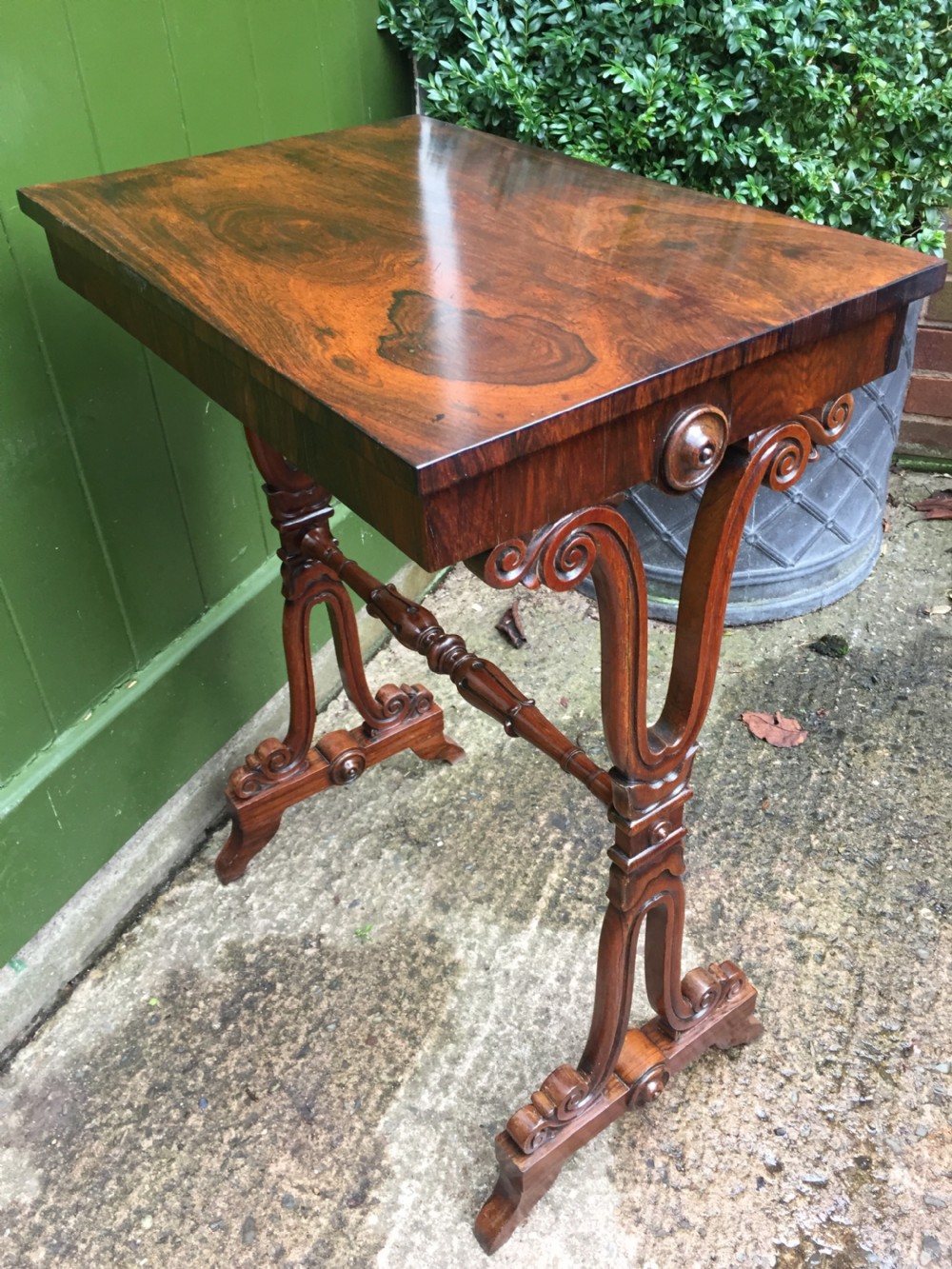Smart early C19th George IV period rosewood lamp table on a carved base. View IV