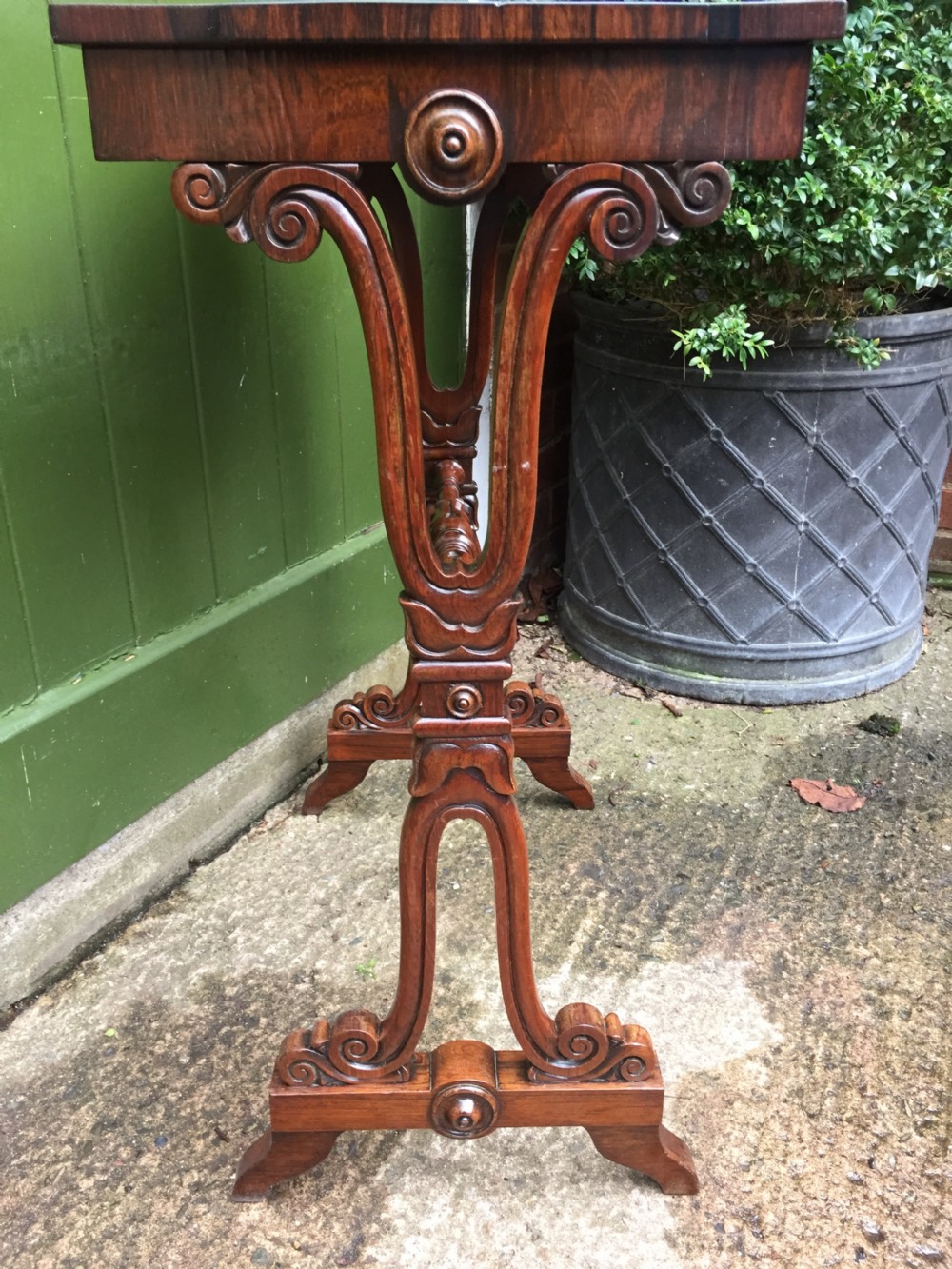 Smart early C19th George IV period rosewood lamp table on a carved base. View VII