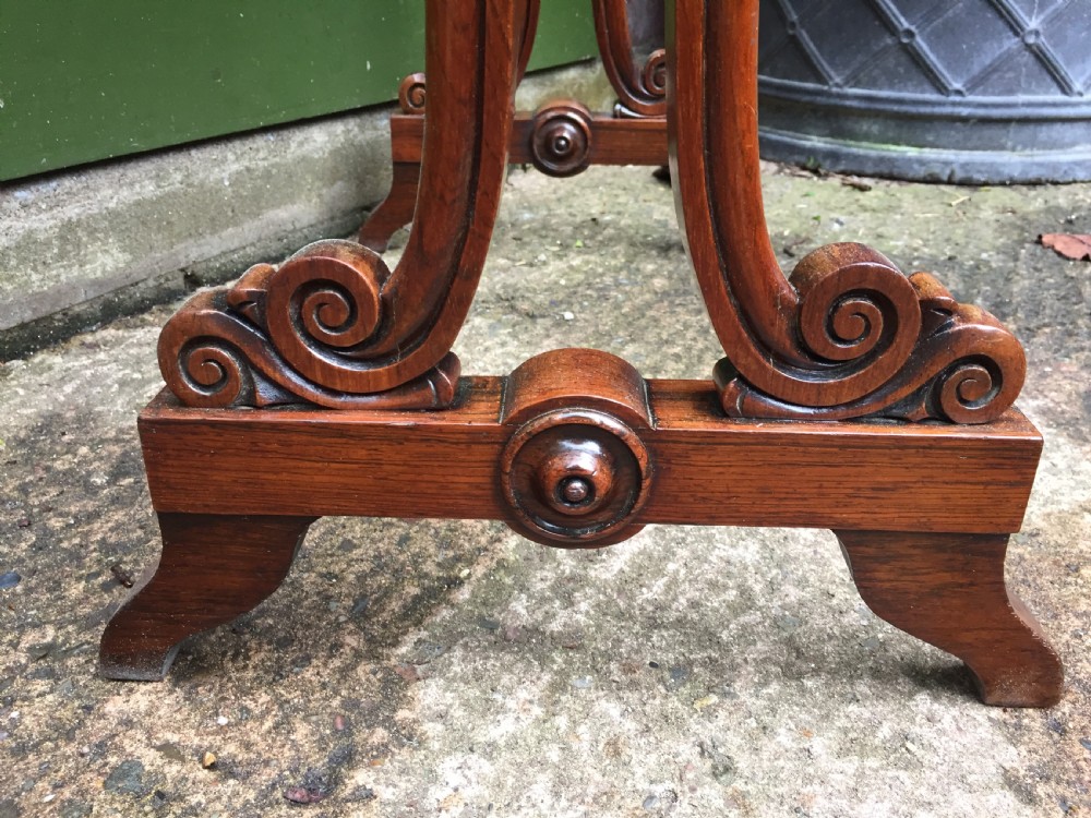 Smart early C19th George IV period rosewood lamp table on a carved base. View VIII
