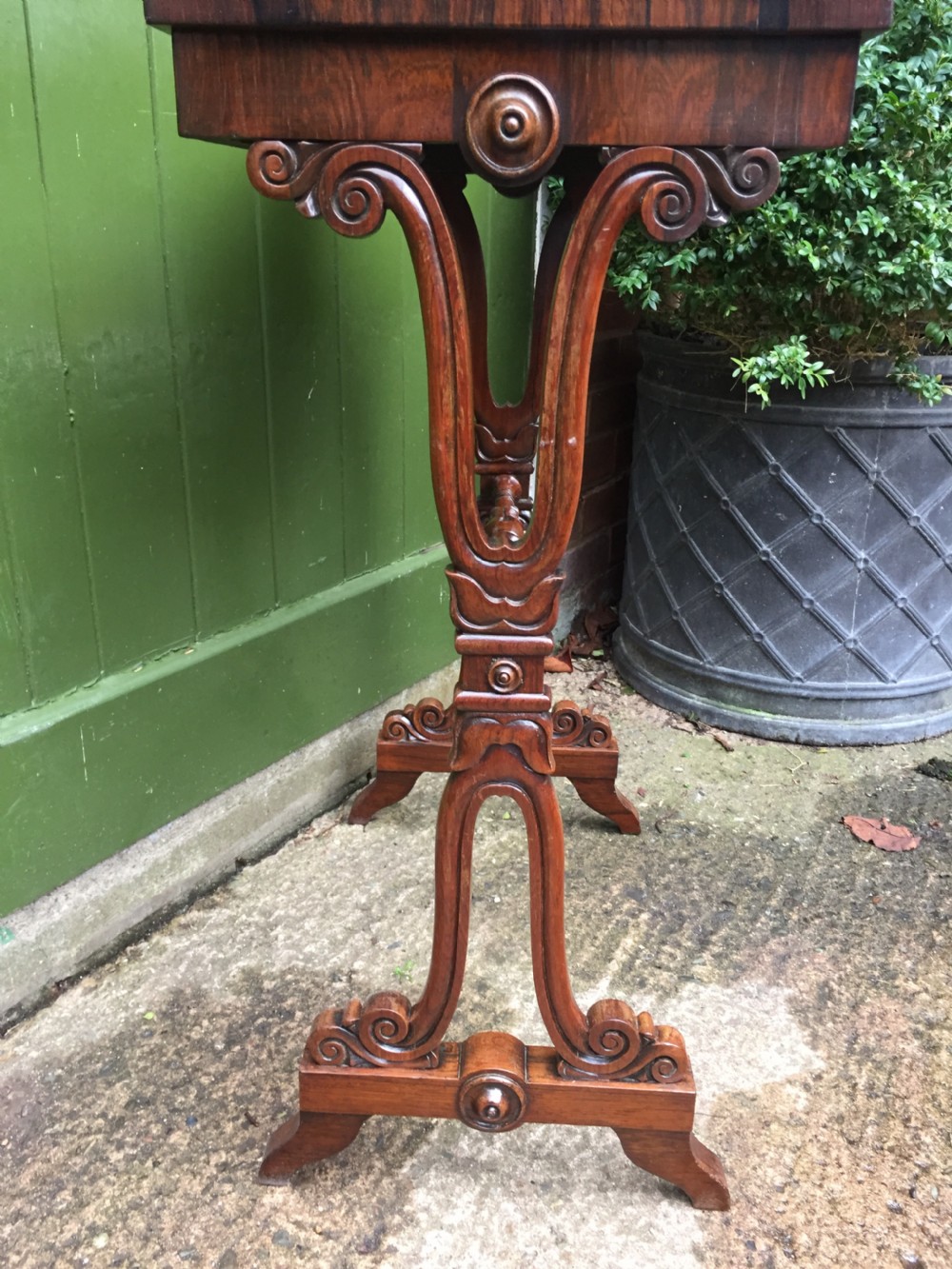 Smart early C19th George IV period rosewood lamp table on a carved base. View IX