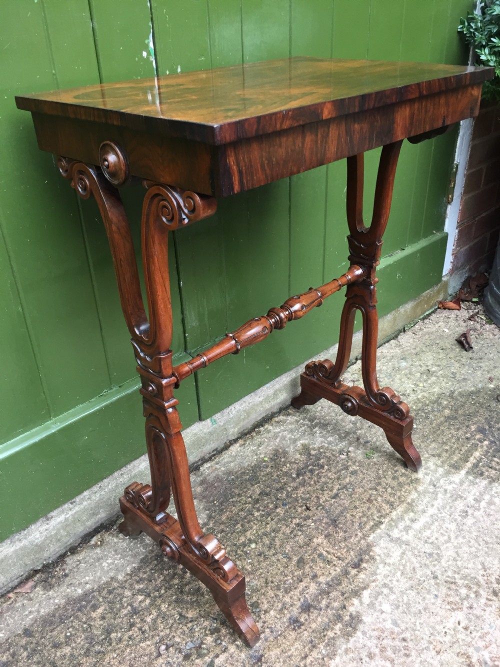 Smart early C19th George IV period rosewood lamp table on a carved base. View XVI
