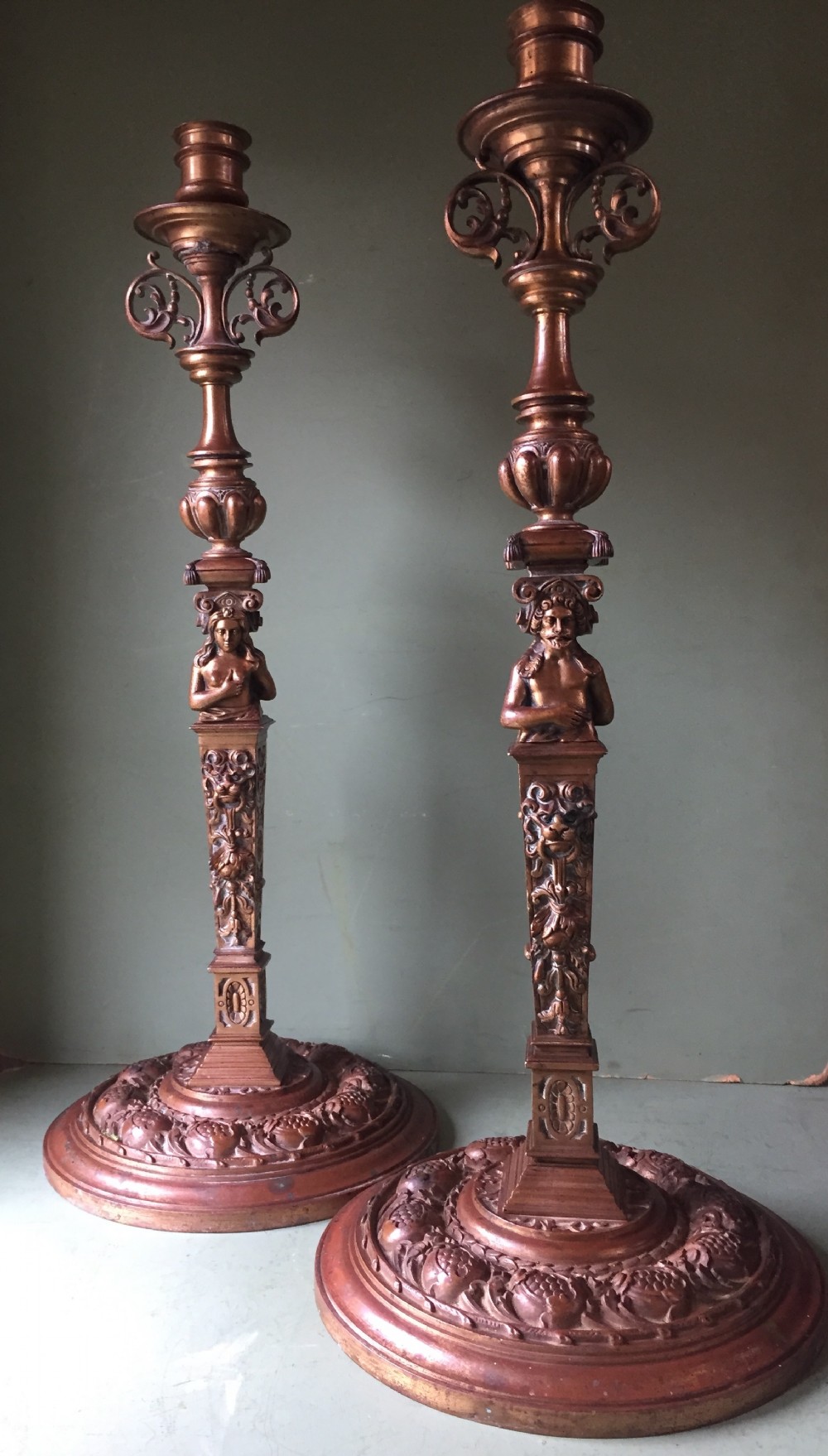 Large pair of C19th cast bronze candlesticks in the Mannerist late Renaissance style .