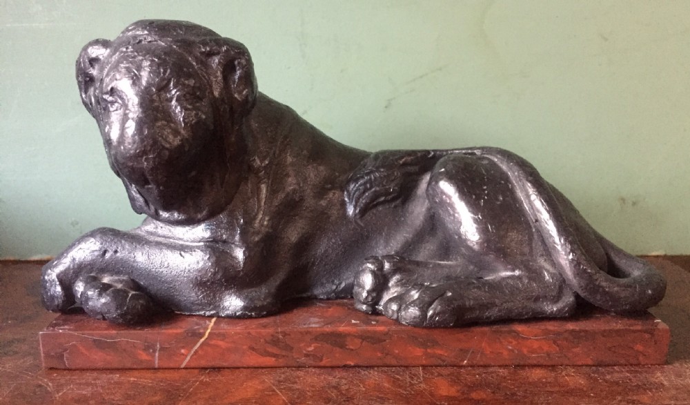 Pair of early C19th 'Grand Tour' souvenir patinated cast-lead lions mounted upon rouge griotte marble plinth bases , copies of the Egyptian lions from The Vatican, Rome. View II
