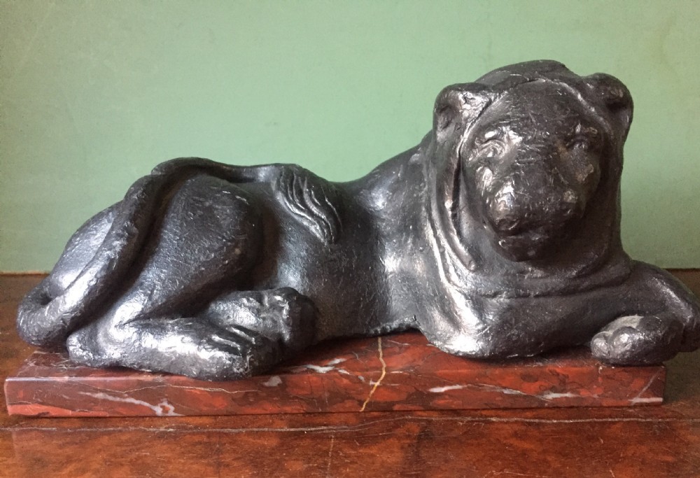Pair of early C19th 'Grand Tour' souvenir patinated cast-lead lions mounted upon rouge griotte marble plinth bases , copies of the Egyptian lions from The Vatican, Rome. View IV