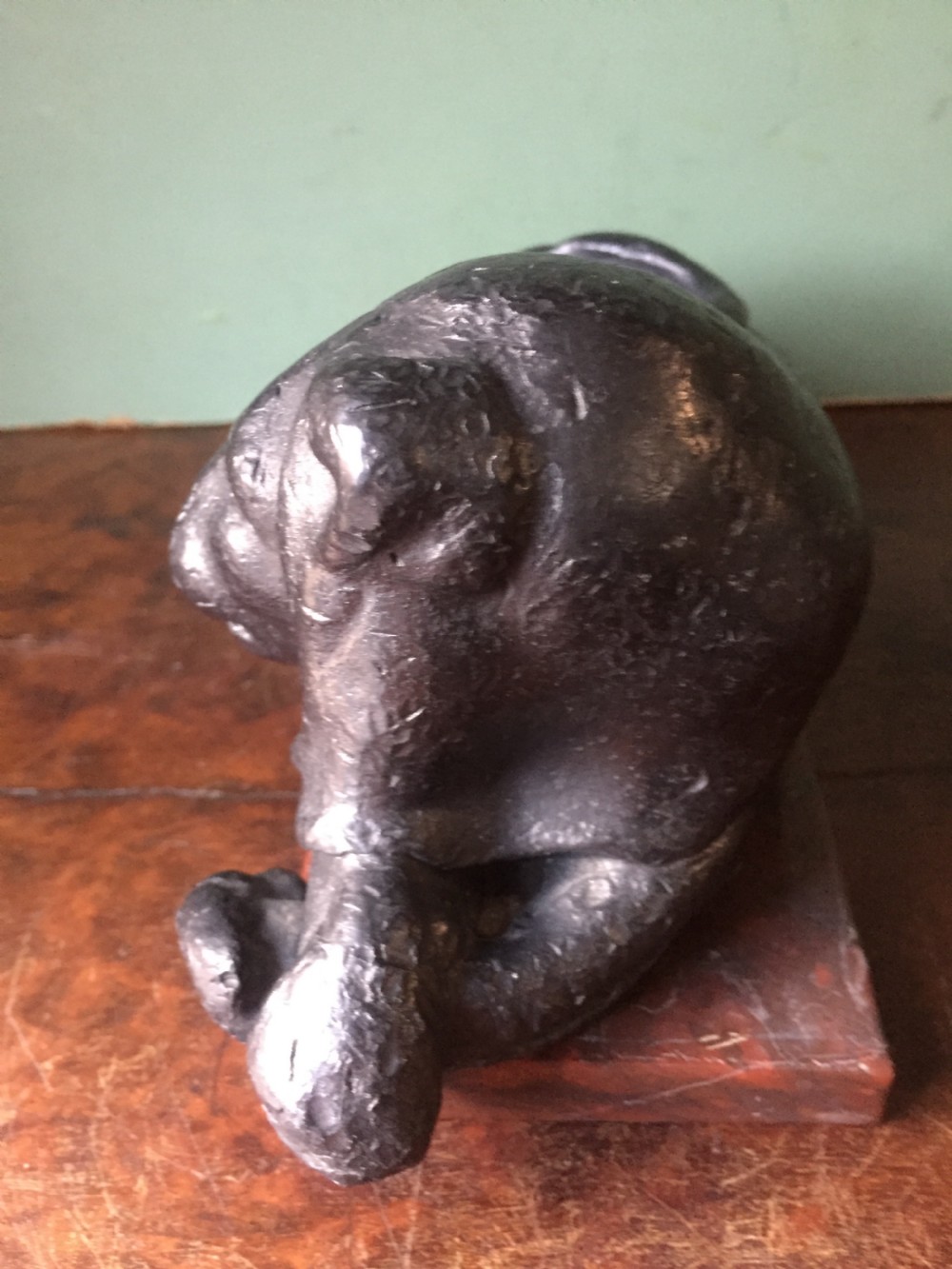 Pair of early C19th 'Grand Tour' souvenir patinated cast-lead lions mounted upon rouge griotte marble plinth bases , copies of the Egyptian lions from The Vatican, Rome. View VI