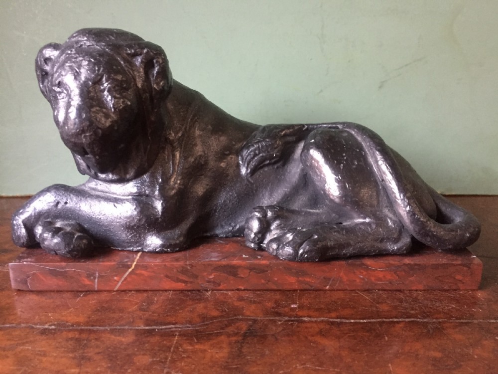 Pair of early C19th 'Grand Tour' souvenir patinated cast-lead lions mounted upon rouge griotte marble plinth bases , copies of the Egyptian lions from The Vatican, Rome. View VIII