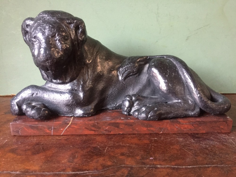 Pair of early C19th 'Grand Tour' souvenir patinated cast-lead lions mounted upon rouge griotte marble plinth bases , copies of the Egyptian lions from The Vatican, Rome. View XVII