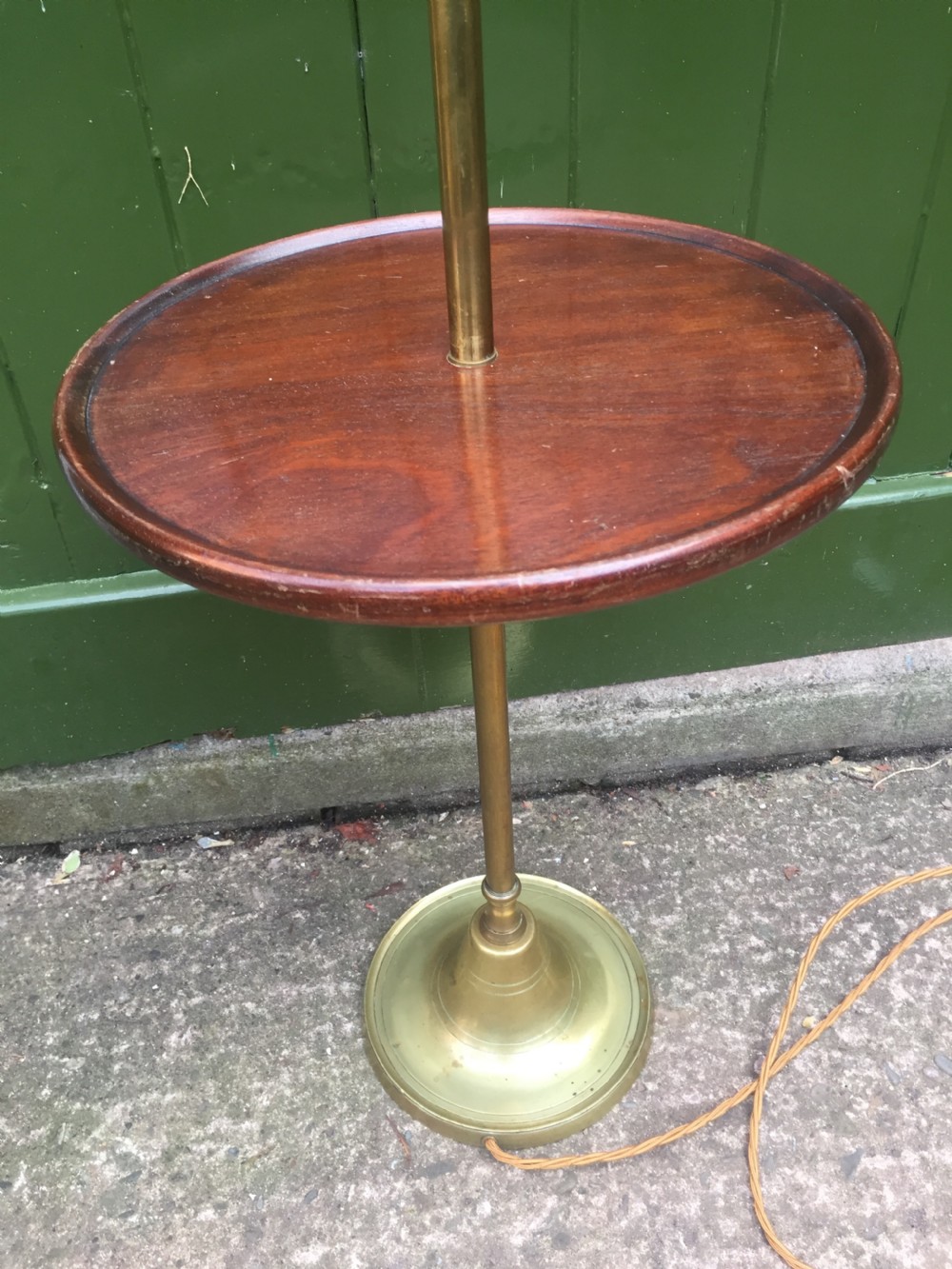 Stylish and practical early C20th brass and mahogany reading lamp with articulated lateral arm and adjustable height column . View V