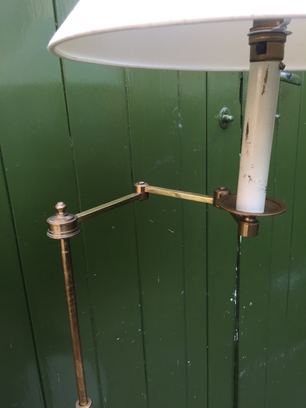 Stylish and practical early C20th brass and mahogany reading lamp with articulated lateral arm and adjustable height column . View VI
