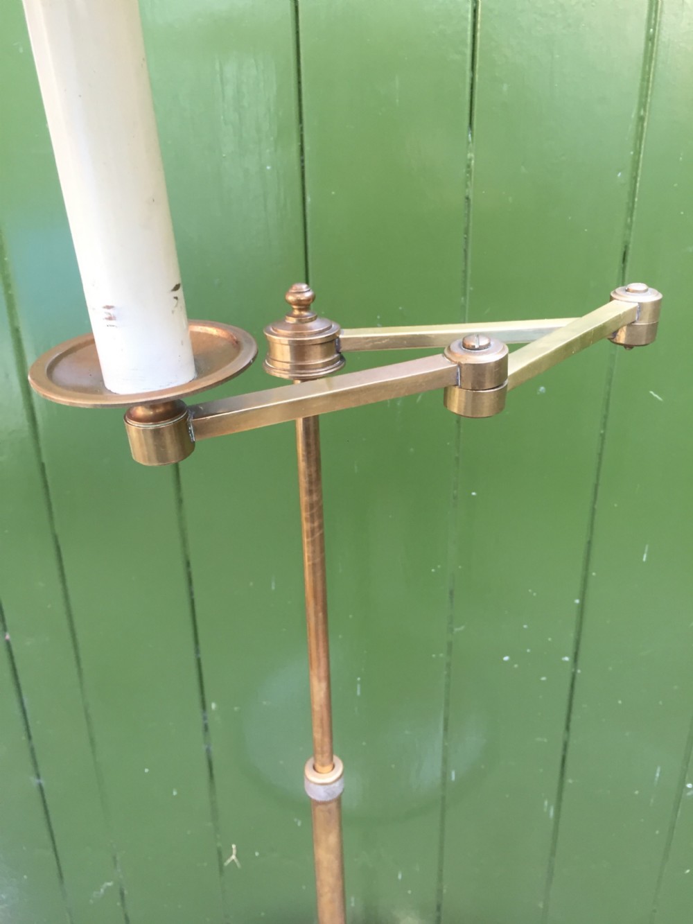 Stylish and practical early C20th brass and mahogany reading lamp with articulated lateral arm and adjustable height column . View VII