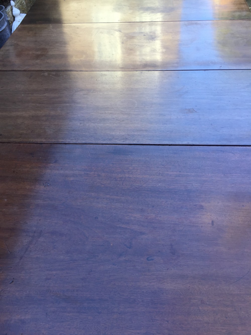 Highly versatile C18th George III period mahogany D-ended dining table with various configuration options in 'as found' country-house condition. View VI