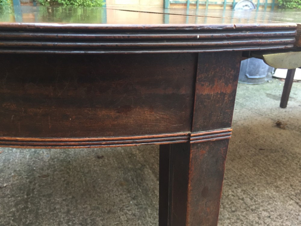 Highly versatile C18th George III period mahogany D-ended dining table with various configuration options in 'as found' country-house condition. View VII
