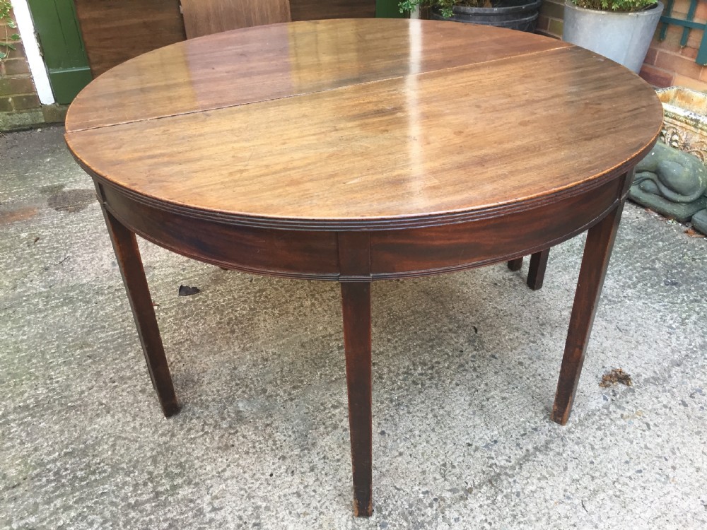 Highly versatile C18th George III period mahogany D-ended dining table with various configuration options in 'as found' country-house condition. View XVII