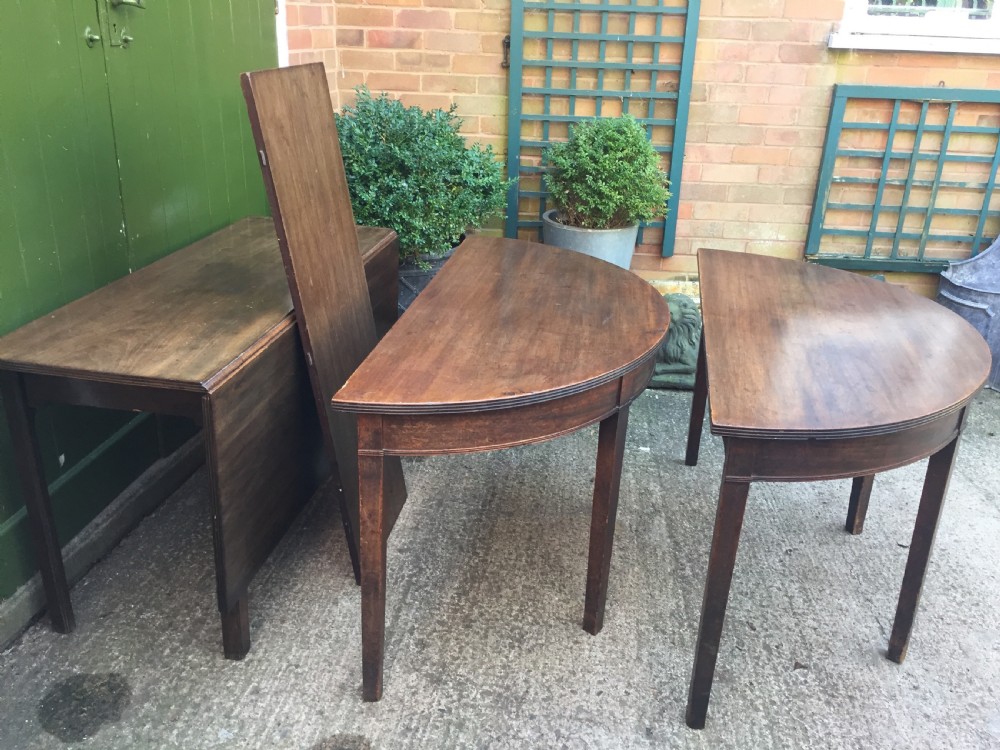 Highly versatile C18th George III period mahogany D-ended dining table with various configuration options in 'as found' country-house condition. View XXX