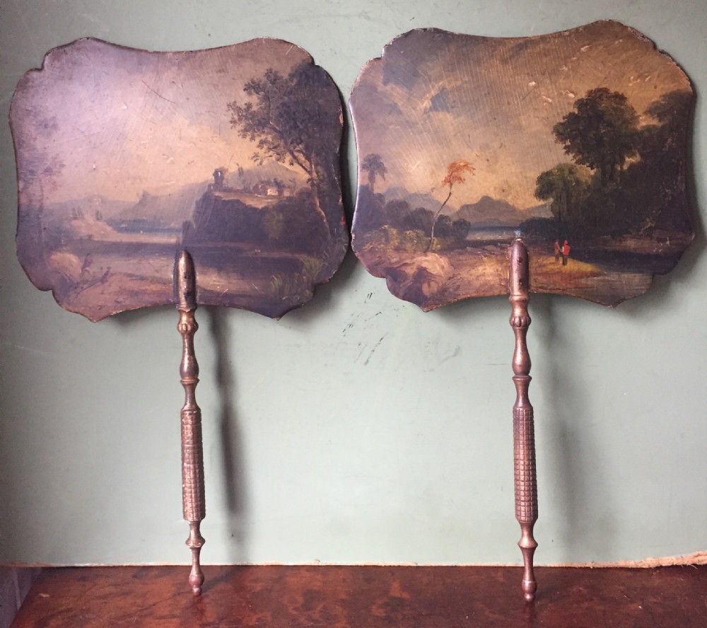 Pair of early C19th Regency period papier-mâché hand-held ladies facial fire-screens.