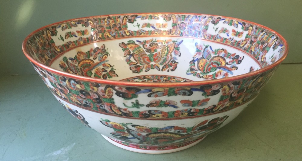 Fine quality C19th Chinese Cantonese export porcelain enamel decorated punch bowl of good large scale with unusual butterfly designs.