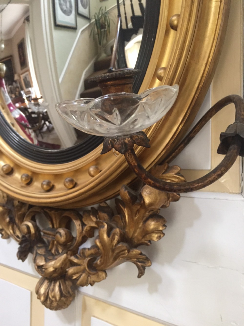 Large and impressive Regency period carved gilt-wood frame girandole convex mirror with eagle surmount. View VIII