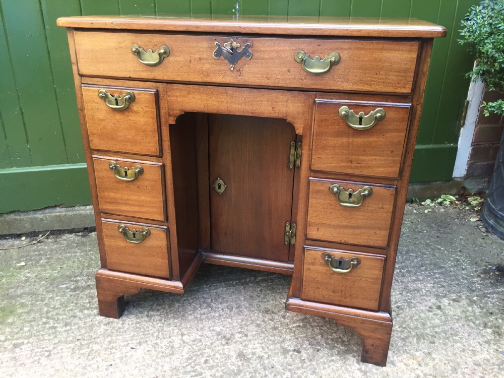 C18th George II period mahogany knee-hole desk of small proportions. View II