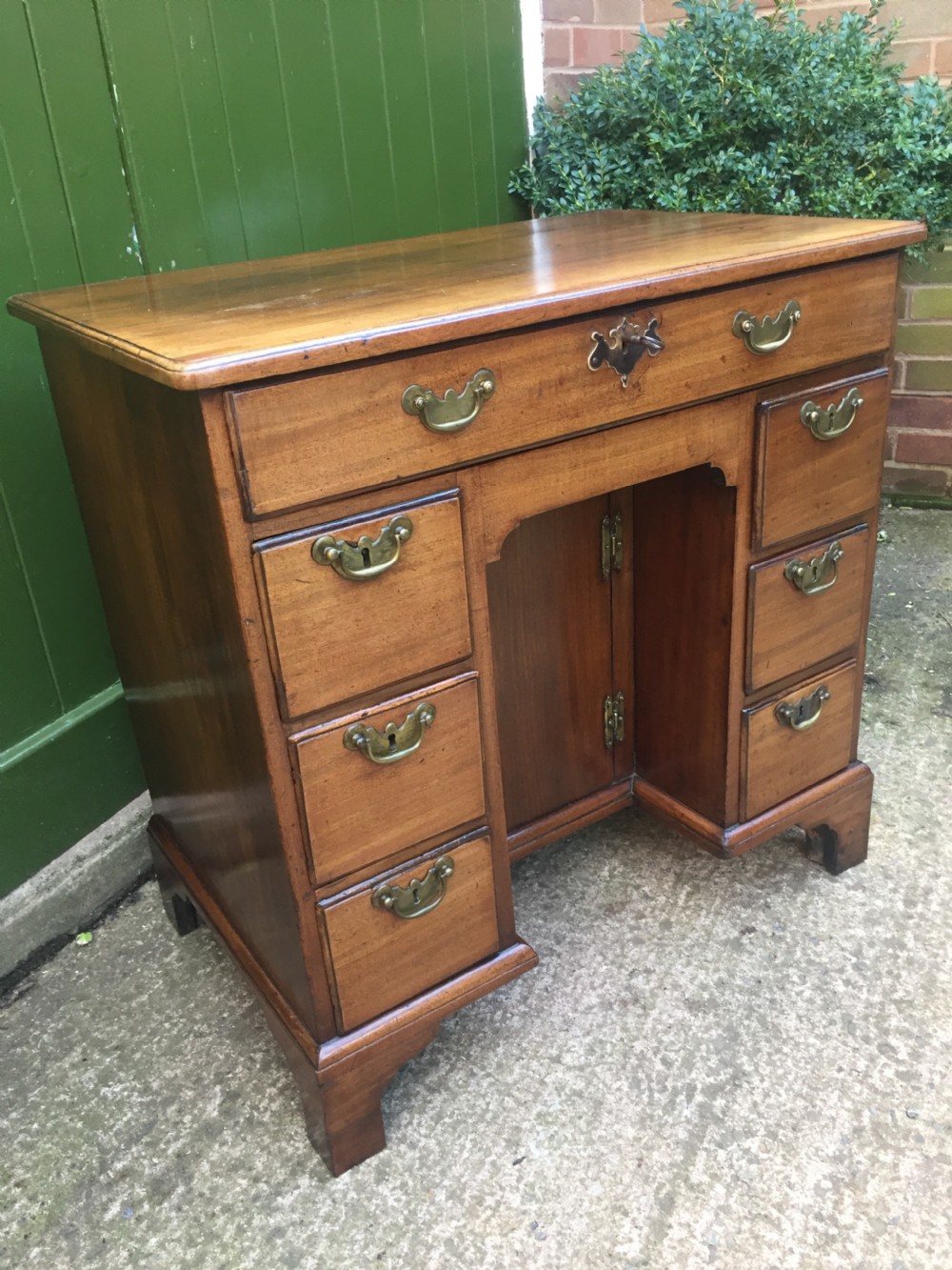 C18th George II period mahogany knee-hole desk of small proportions. View IV