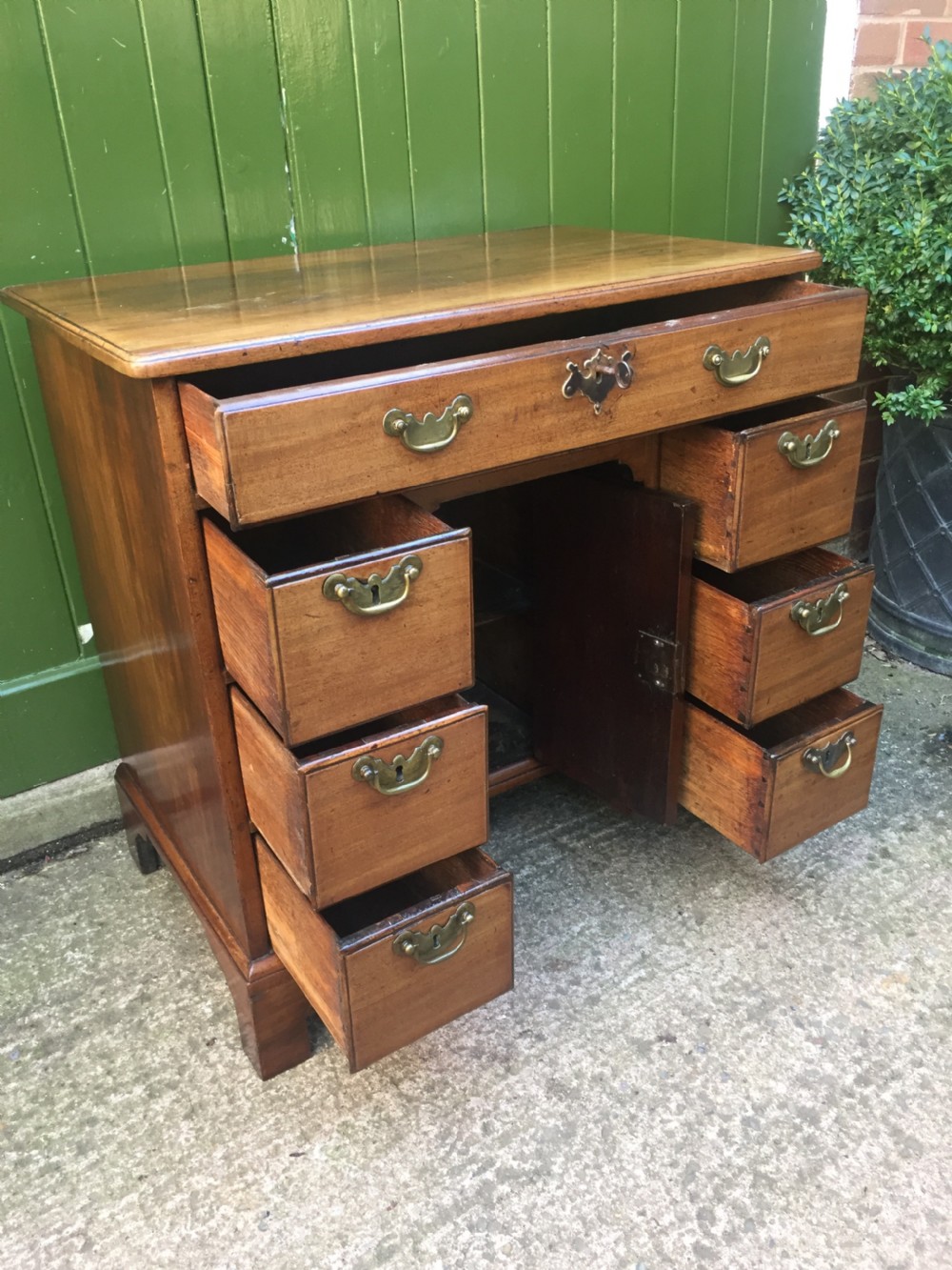 C18th George II period mahogany knee-hole desk of small proportions. View V