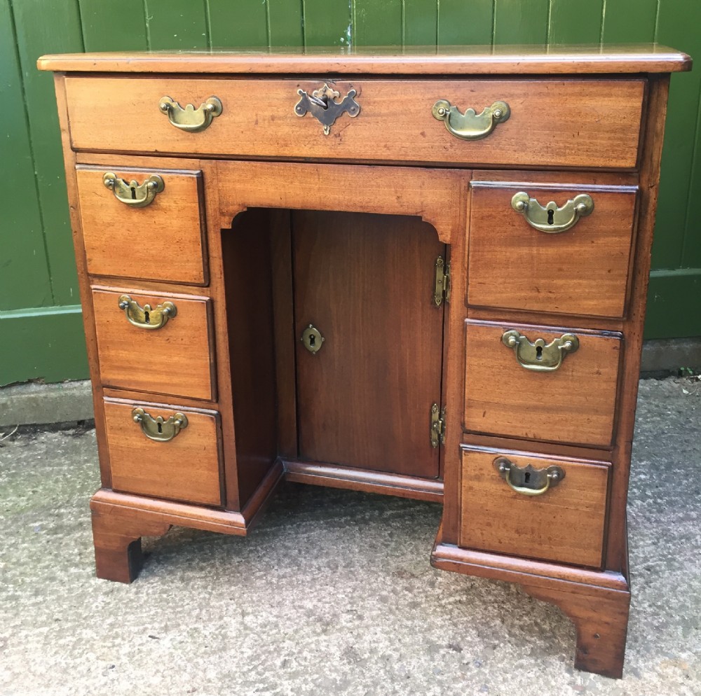 C18th George II period mahogany knee-hole desk of small proportions.