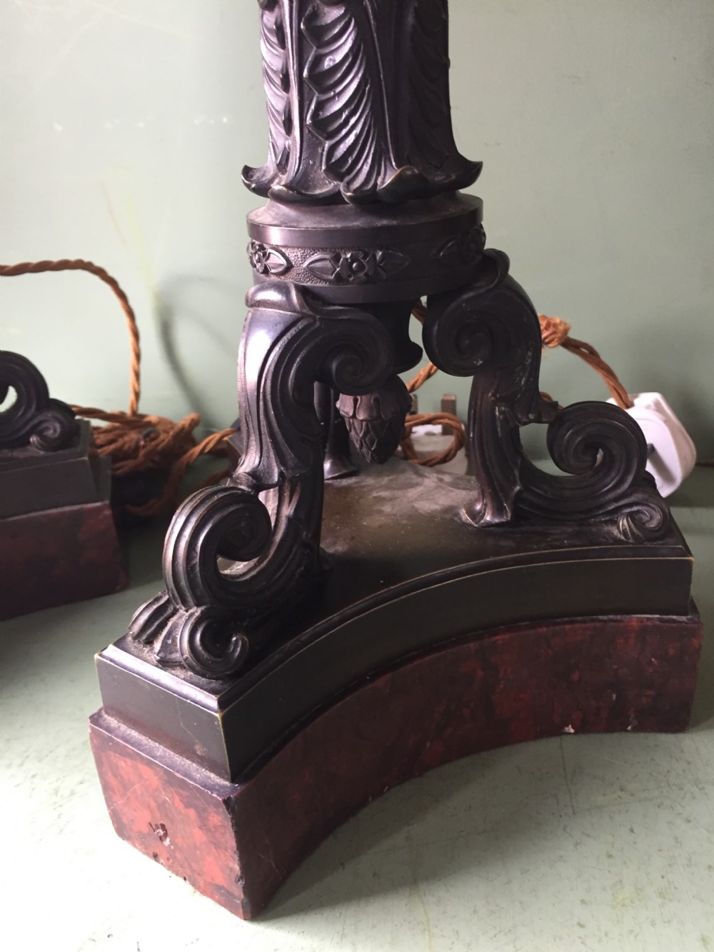 Imposing pair of early C19th French Charles X period bronze lamps on 'rouge griotte' marble bases. View II