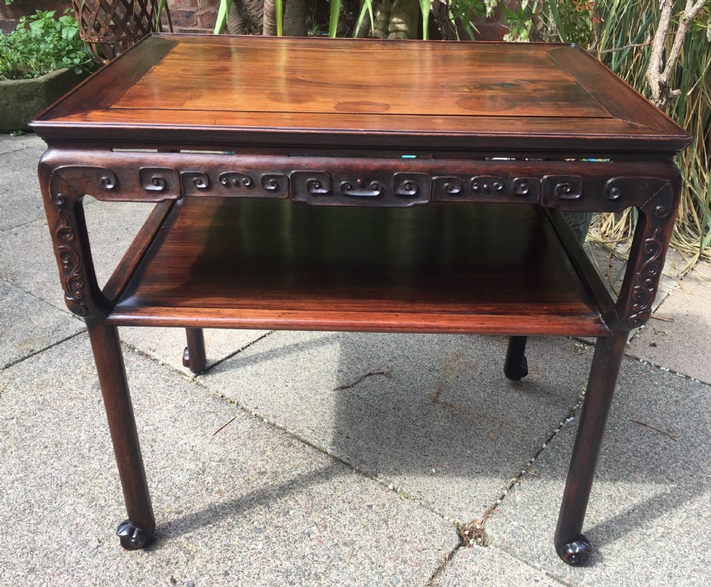 Late C19th Chinese Qing Dynasty carved hardwood 2-tier centre table of freestanding design.