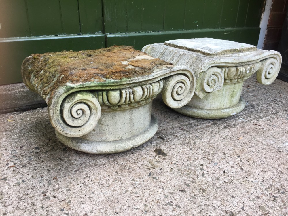 Decorative pair of early C20th composition stone ionic capitals . View II