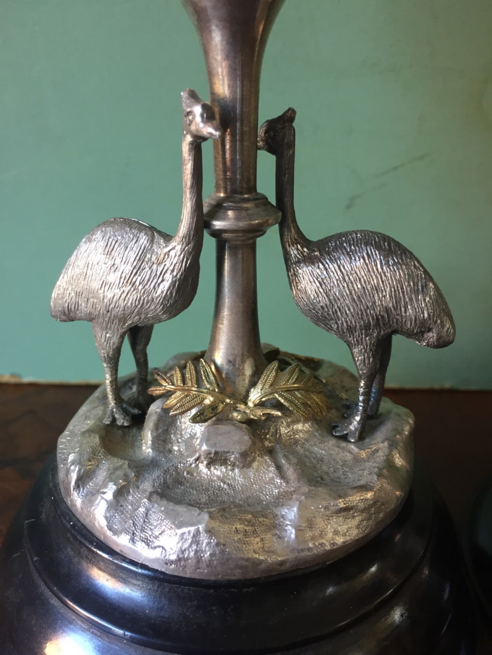 Of Australian interest: Pair of late C19th silver-plated mounted Emu eggs on ebonised socle bases. View V