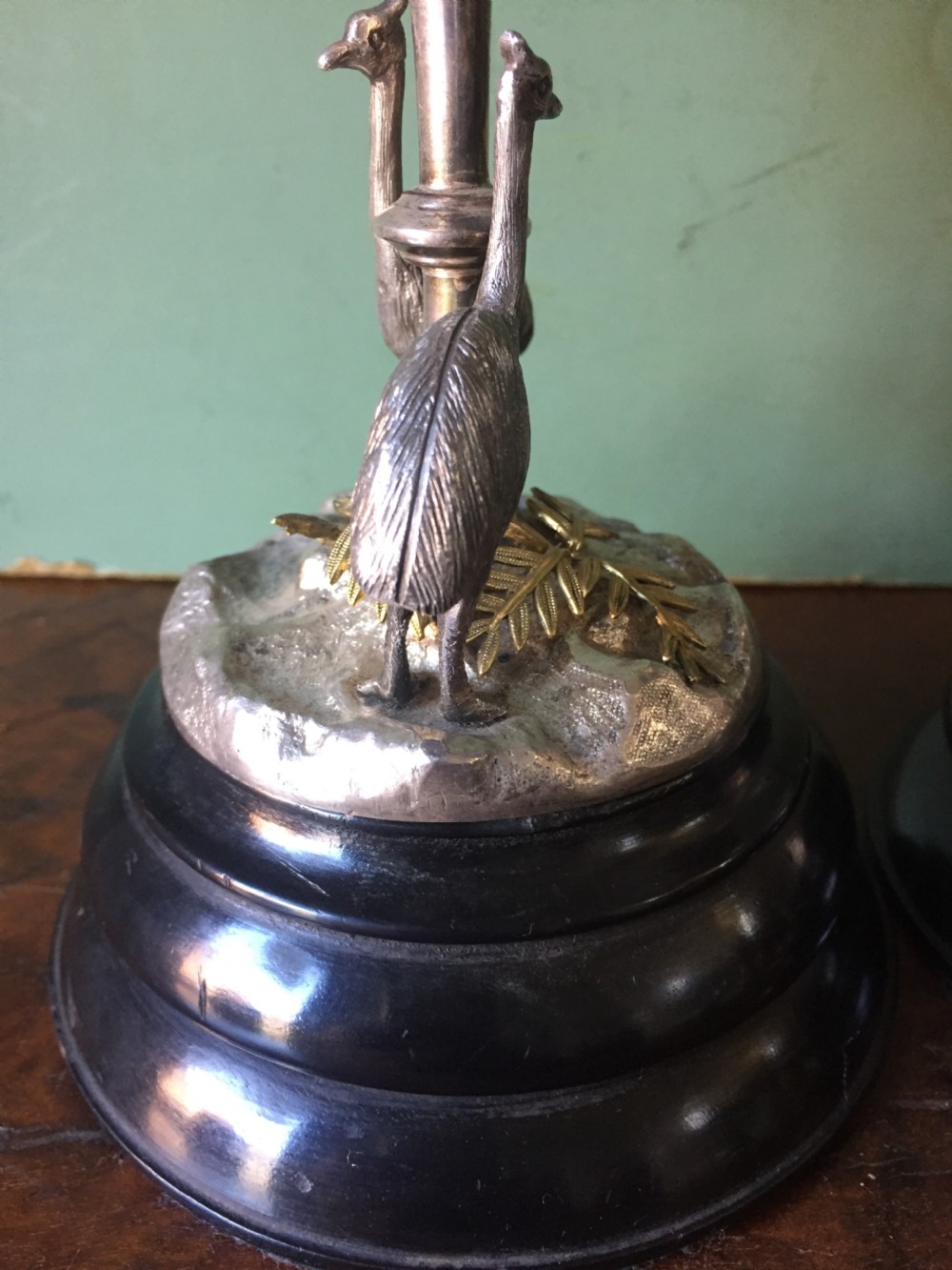 Of Australian interest: Pair of late C19th silver-plated mounted Emu eggs on ebonised socle bases. View VI