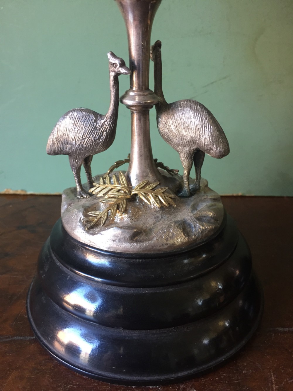 Of Australian interest: Pair of late C19th silver-plated mounted Emu eggs on ebonised socle bases. View VII