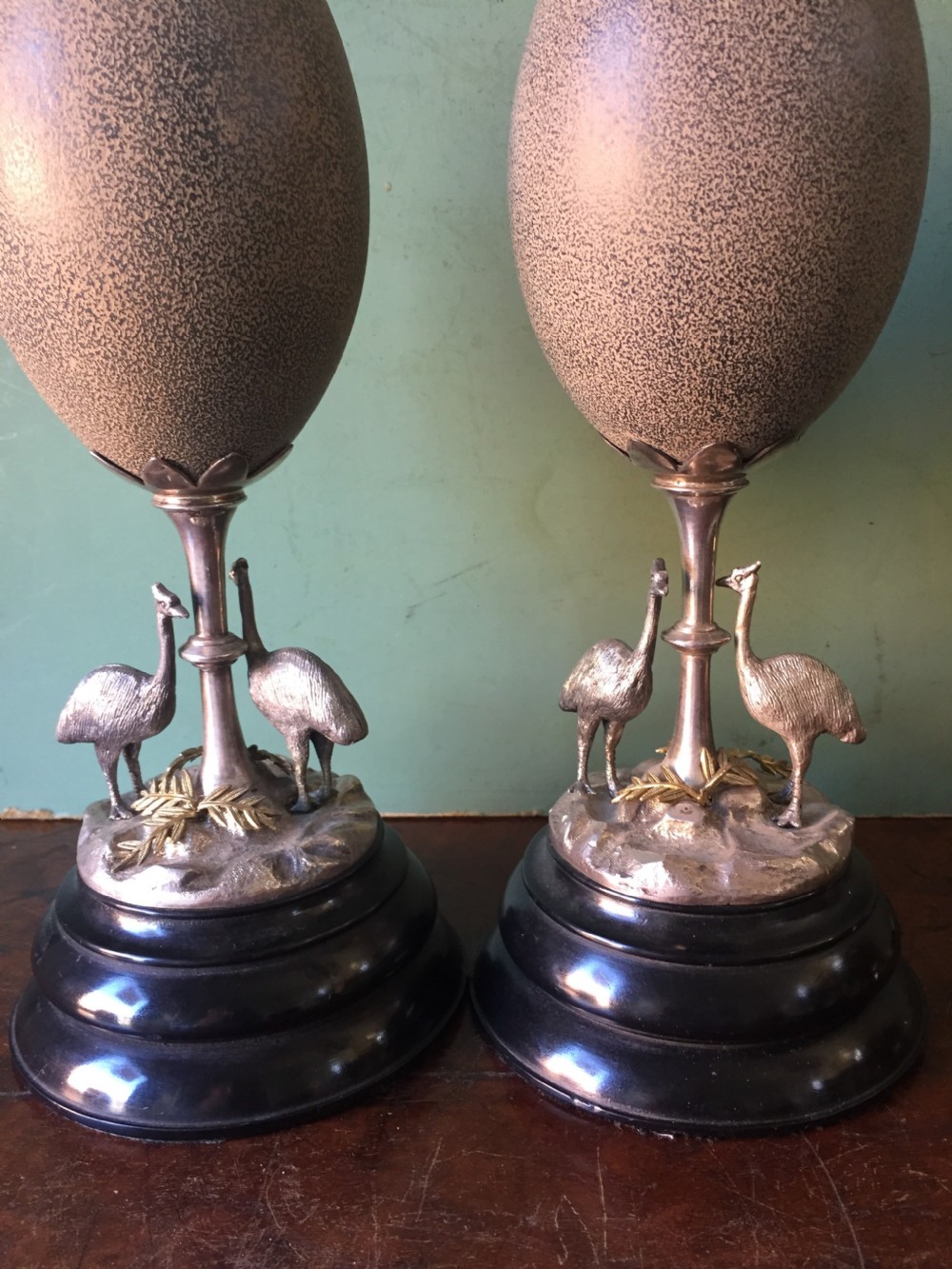 Of Australian interest: Pair of late C19th silver-plated mounted Emu eggs on ebonised socle bases. View XI
