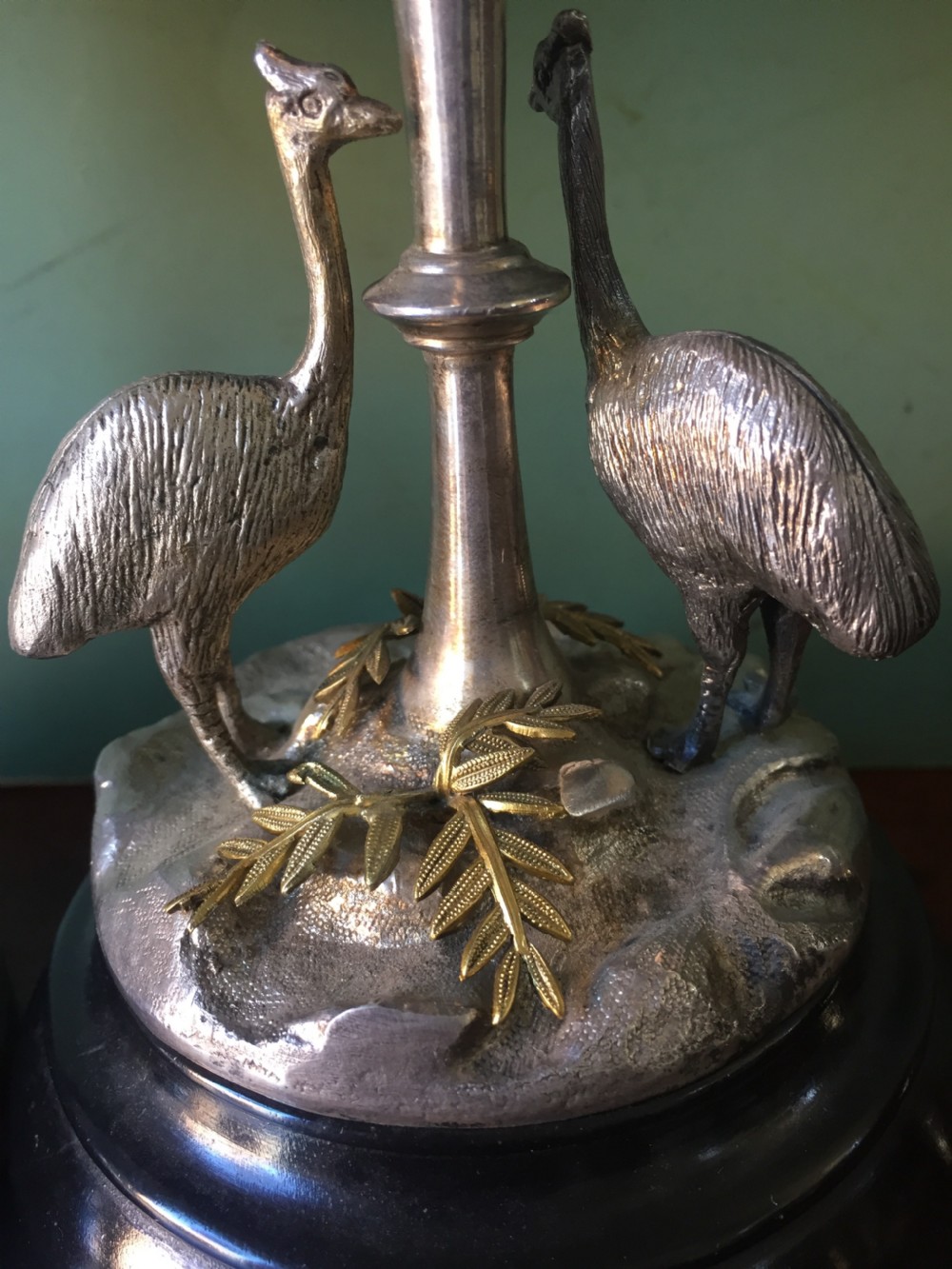 Of Australian interest: Pair of late C19th silver-plated mounted Emu eggs on ebonised socle bases. View XV