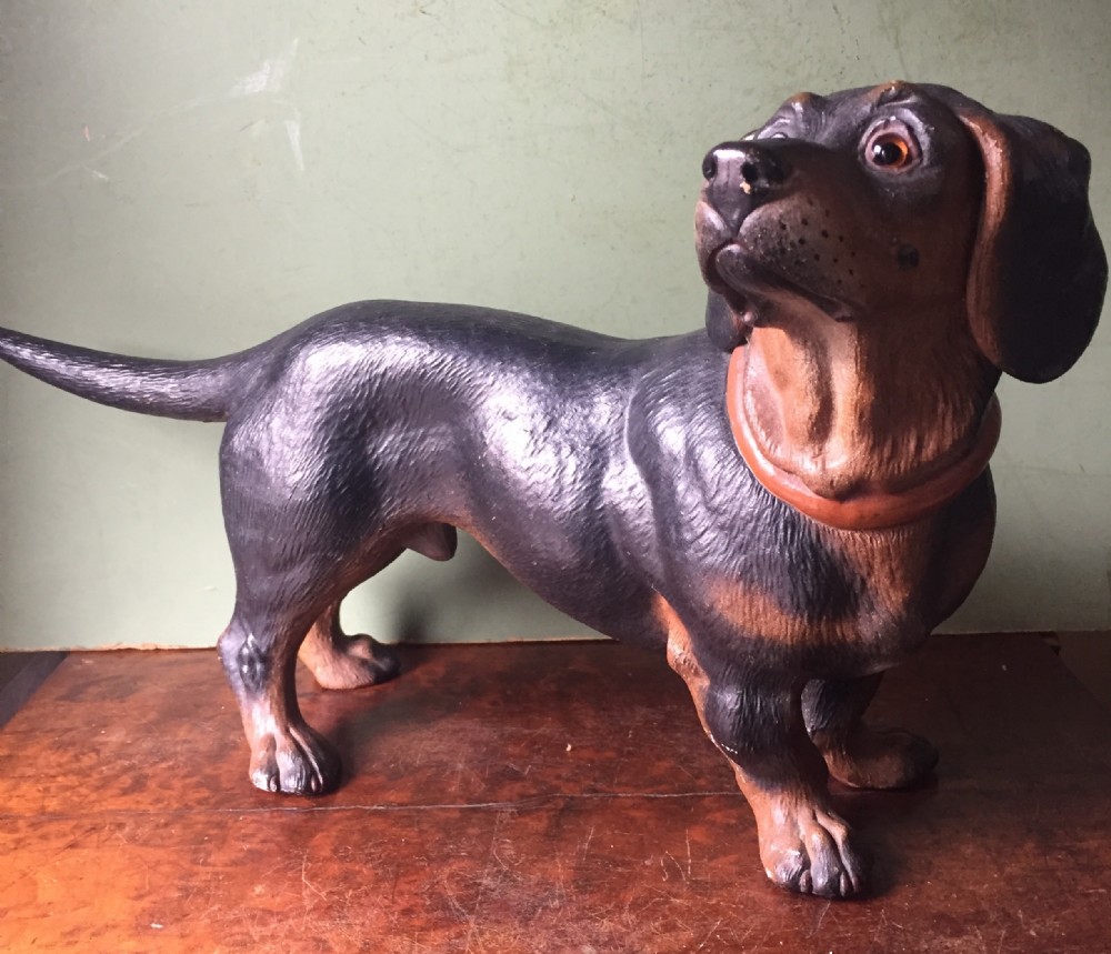 Late C19th Austrian decorated terracotta study of a miniature dachshund.
