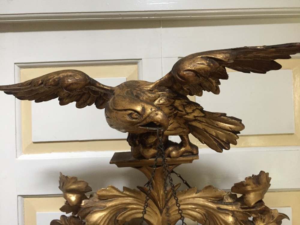 Large and impressive Regency period carved gilt-wood frame girandole convex mirror with eagle surmount. View XVIII