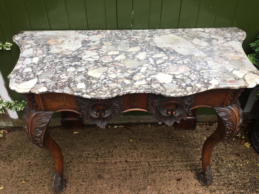 Exhuberant C19th Irish walnut console table with a rare Breccia marble slab top . View IV