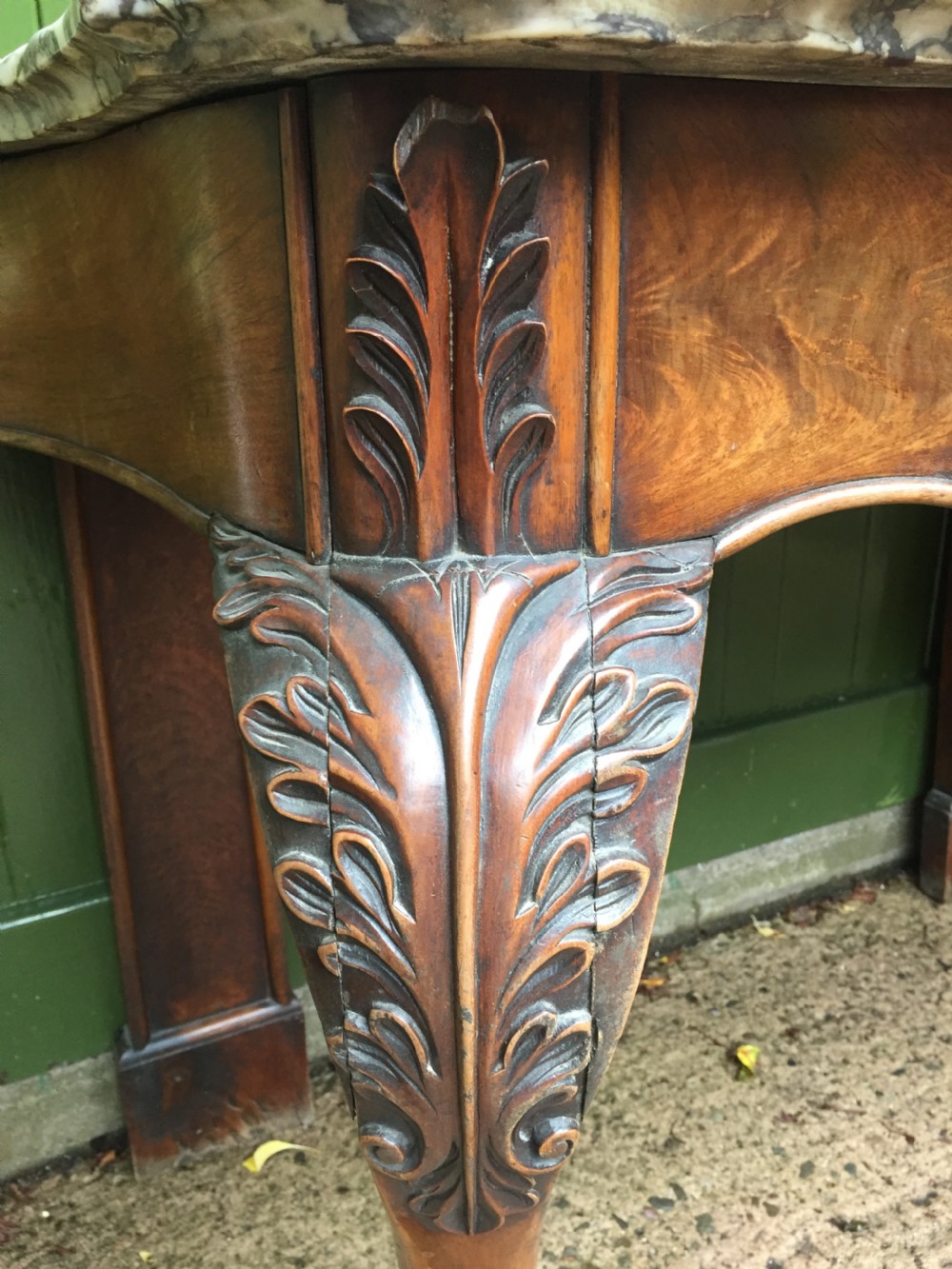 Exhuberant C19th Irish walnut console table with a rare Breccia marble slab top . View VII