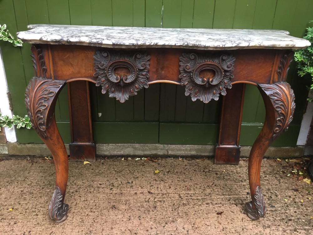Exhuberant C19th Irish walnut console table with a rare Breccia marble slab top . View IX