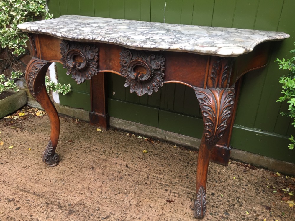 Exhuberant C19th Irish walnut console table with a rare Breccia marble slab top . View XII