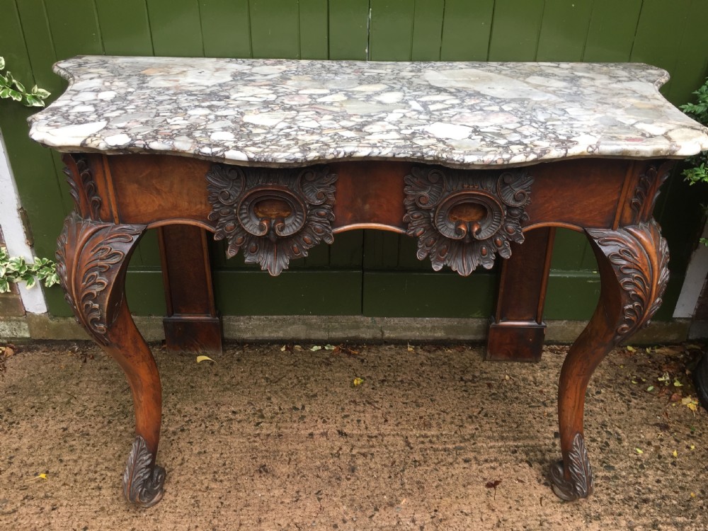 Exhuberant C19th Irish walnut console table with a rare Breccia marble slab top . View XIII
