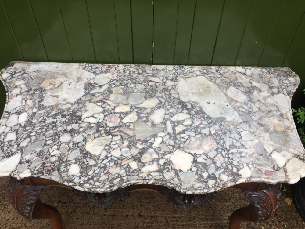 Exhuberant C19th Irish walnut console table with a rare Breccia marble slab top . View XV