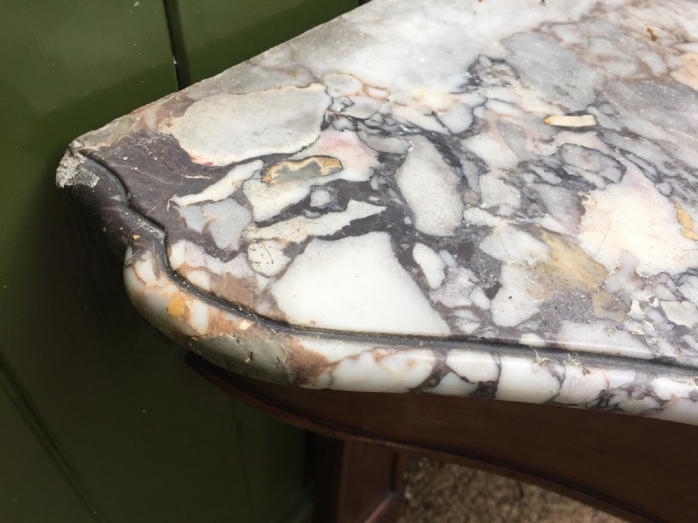 Exhuberant C19th Irish walnut console table with a rare Breccia marble slab top . View XVII