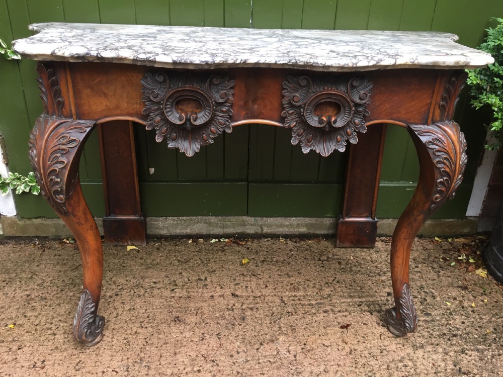 Exhuberant C19th Irish walnut console table with a rare Breccia marble slab top . View XVIII