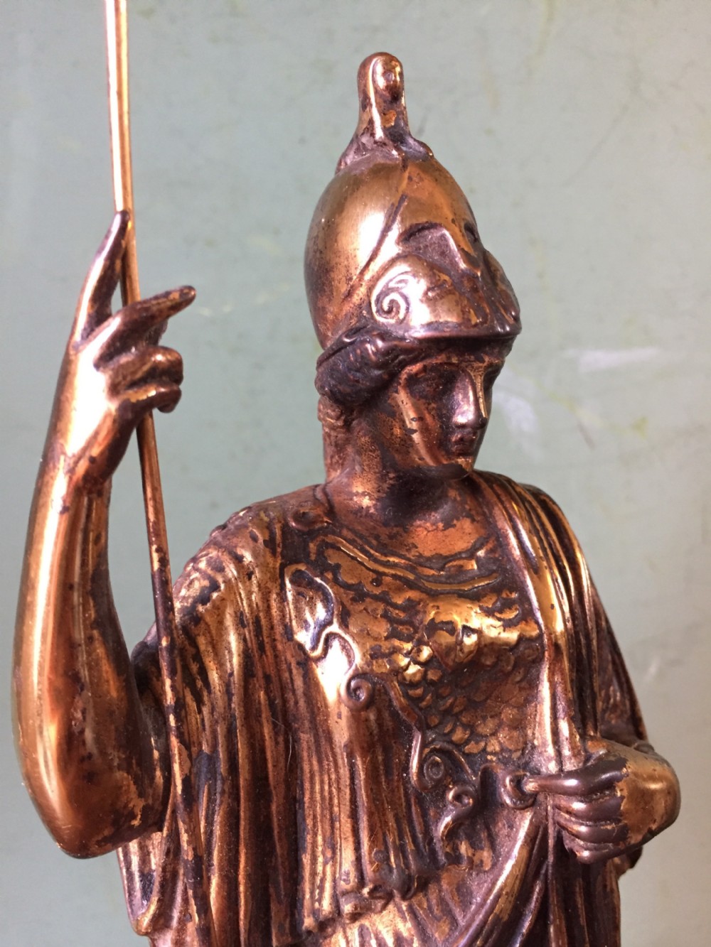 A nineteenth-century gilded bronze sculpture depicting the classical goddess Athena holding a spear, standing on a dark marble base. View IX